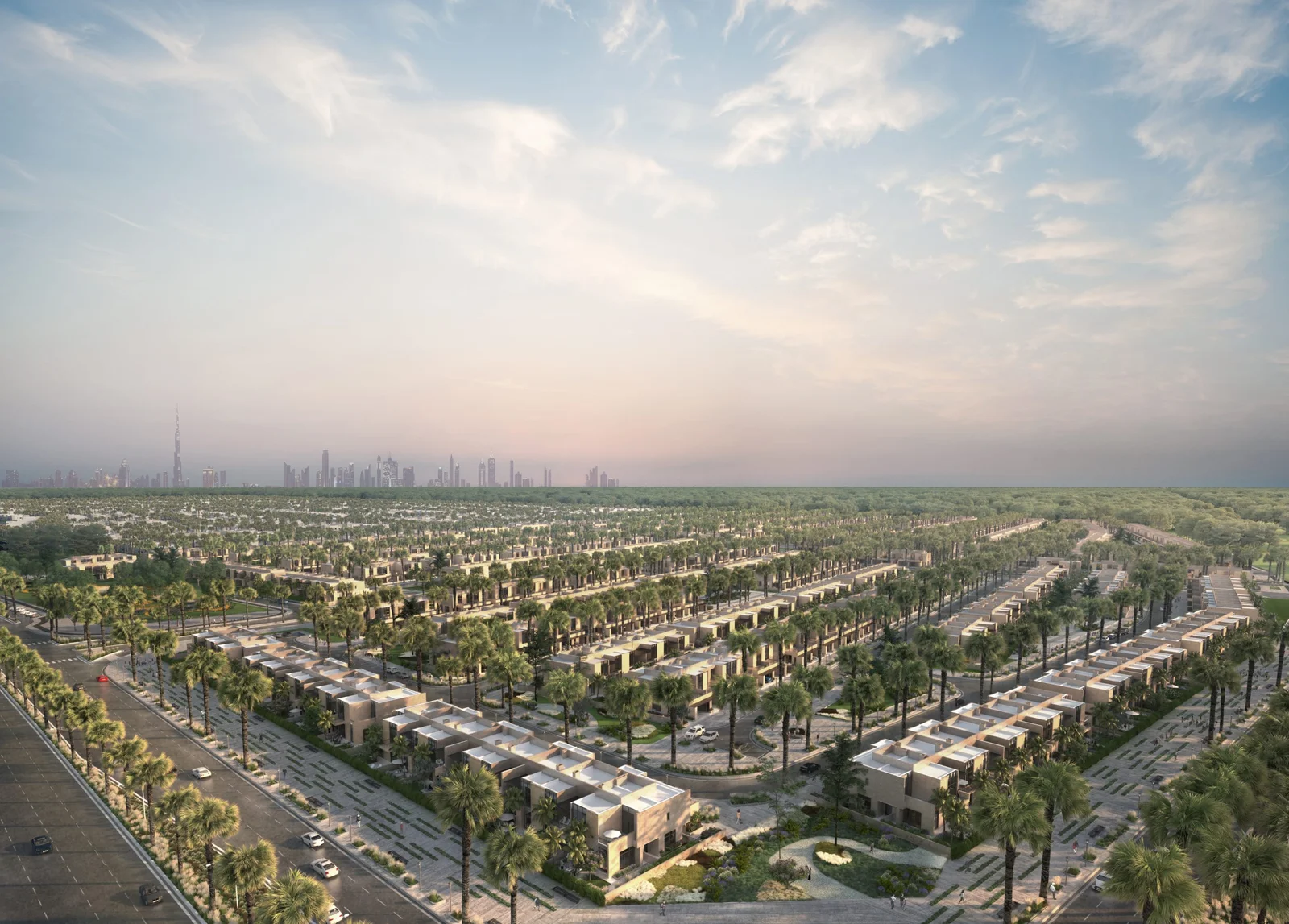 Paradise Hills, Dubai villa community at dusk with the city skyline beyond